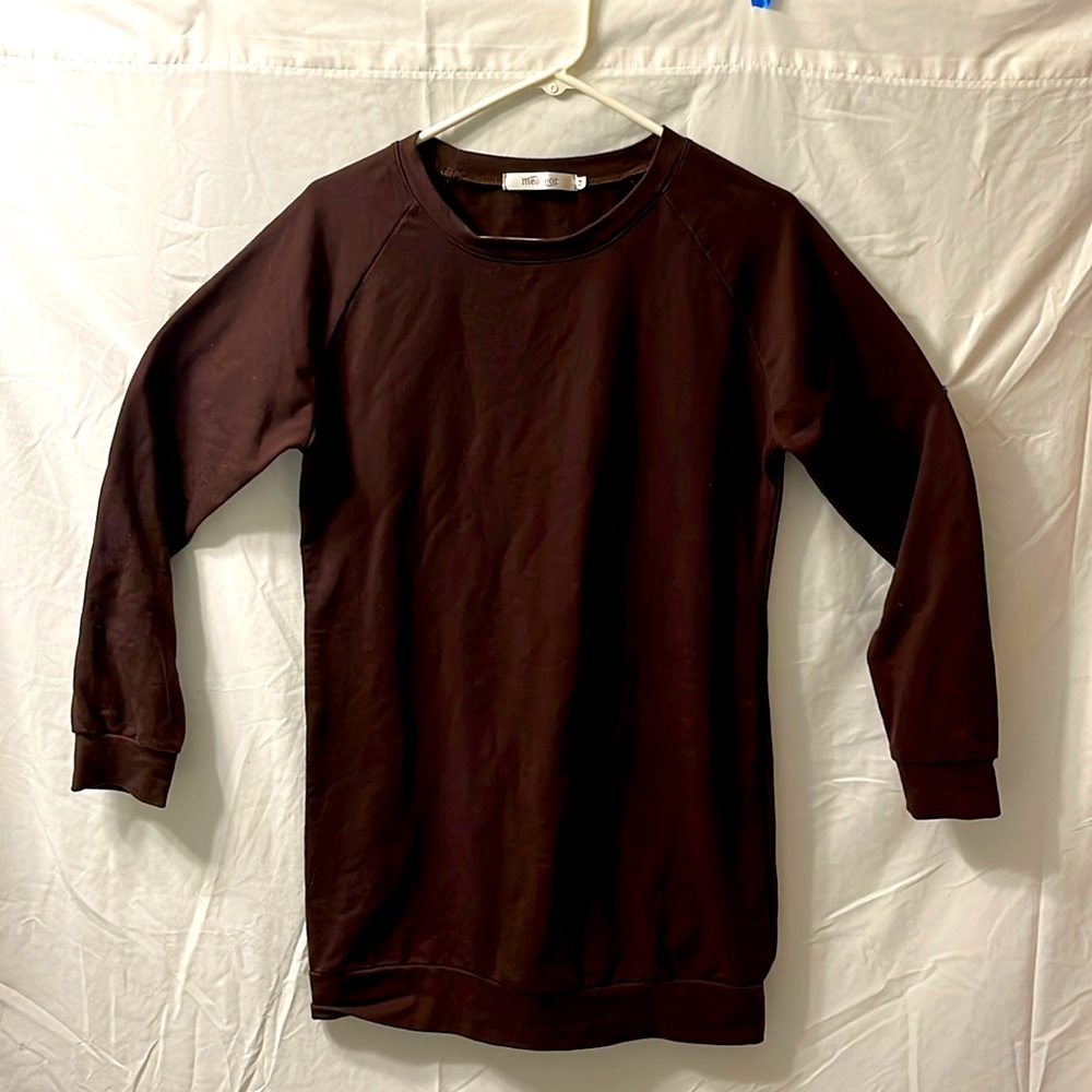 This is brown meaneor long sweater that is great to just wear around the house.